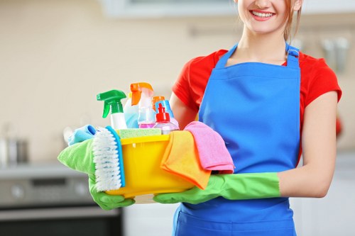 Cleaner preparing professional supplies before a service visit