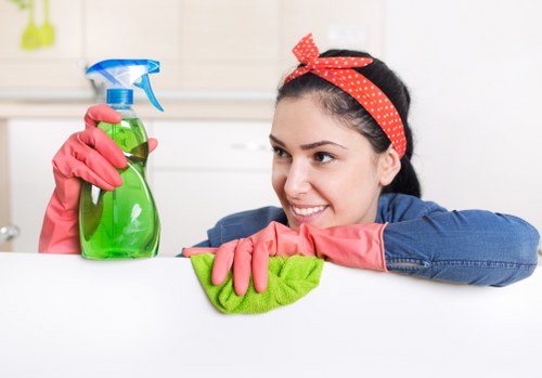 Office cleaning team maintaining desks and shared spaces in Shepherdsbush